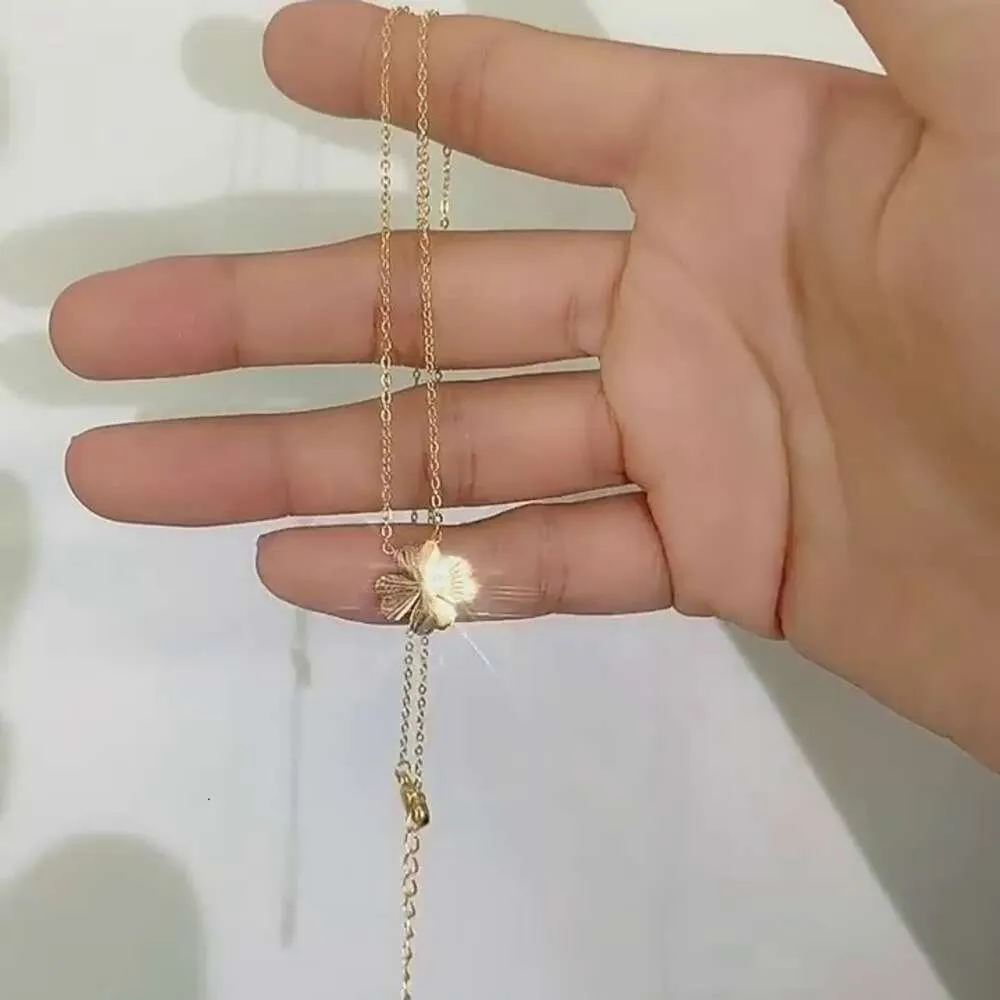 Collana unisex con ciondolo a forma di fiore in acciaio al titanio, catena maglione