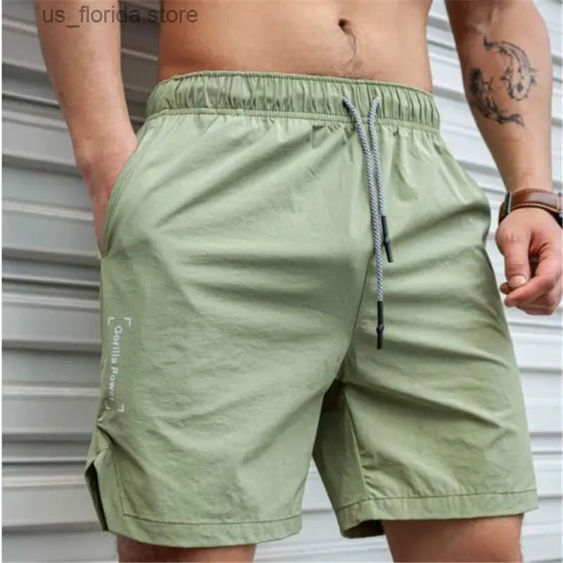 Män shorts män heta shorts lätt tunna korta byxor kör squat fitness shorts män gym bär snabbtorkande dragskorshorts y240320