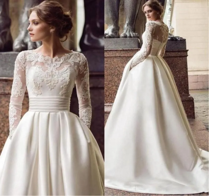 2020 nouveau design une ligne robes de mariée col transparent manches longues dentelle appliques perlées satin avec poches balayage train grande taille Brid9748630