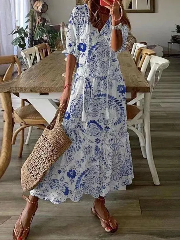 Vintage Floral Embroidered V-Neck smocked maxi dress with Lace and Hollow Out by Foridol - Perfect for Casual Occasions and Bohemian Sundress Loose