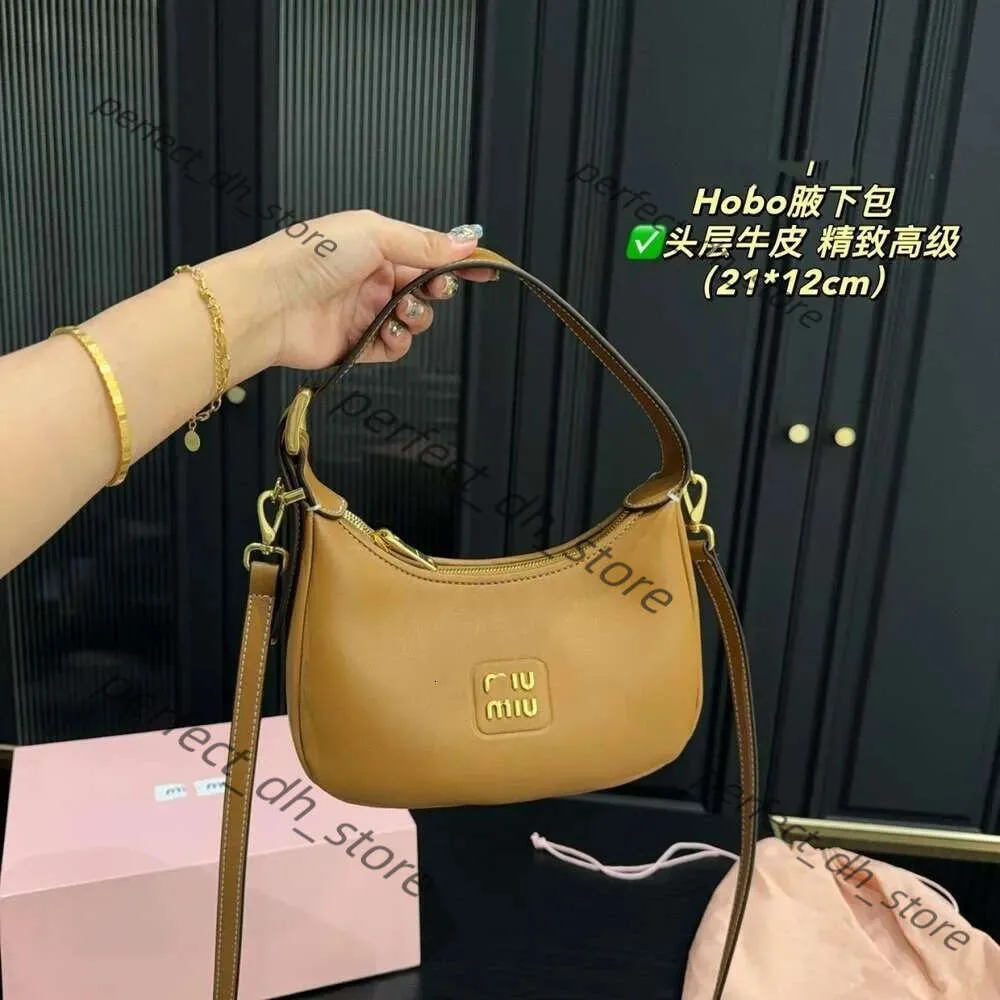 Borsa Miumiubag Borsa a tracolla di lusso a spalla Mui alla moda Borsa da donna Borsa in pelle da sella squisita312112