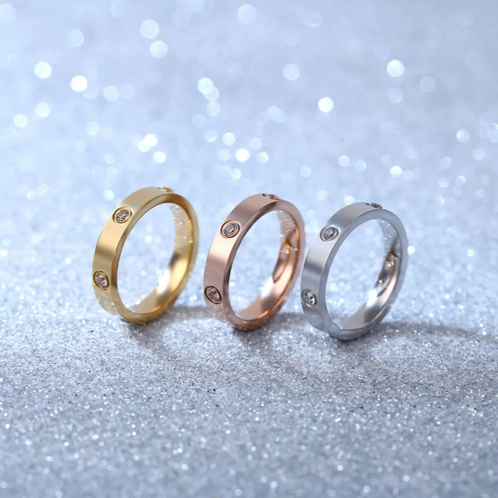 parafuso Carter Rings prego a anel de aço de titânio de seis diamantes para homens mulheres com temperamento elegante incrustado de diamante em jóias inoxidáveis x85k