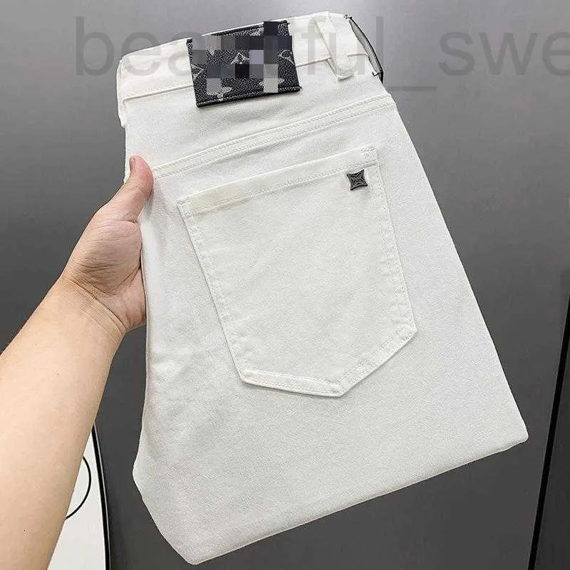 Jeans da uomo firmati Luce di lusso Qualità Autunno e inverno Slim Fit Elastico di fascia alta Versatile Nero Bianco Pantaloni a gamba dritta per tutte le stagioni 7X8Z