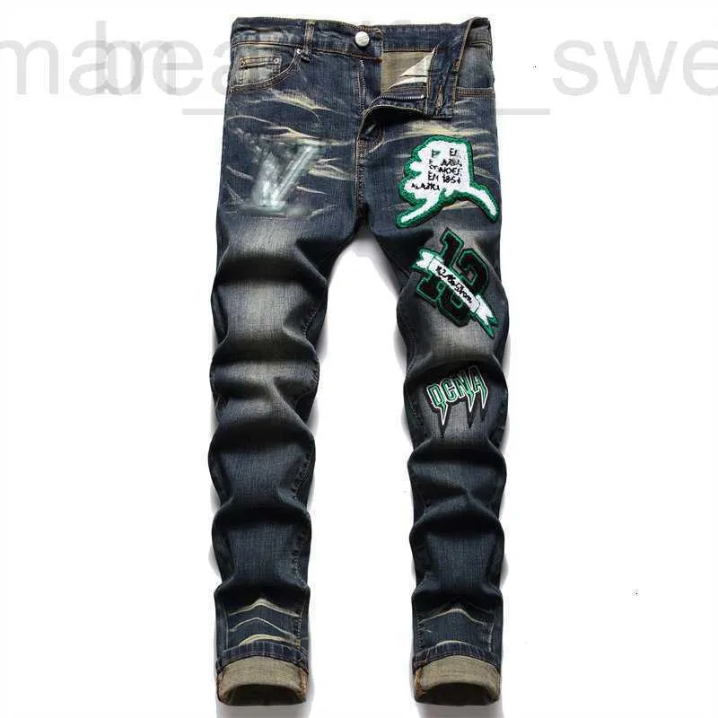 Jeans da uomo firmati estivi da strada jeans da uomo pantaloni di cotone stampato moda giovanile attillati a vita media casual E0MW