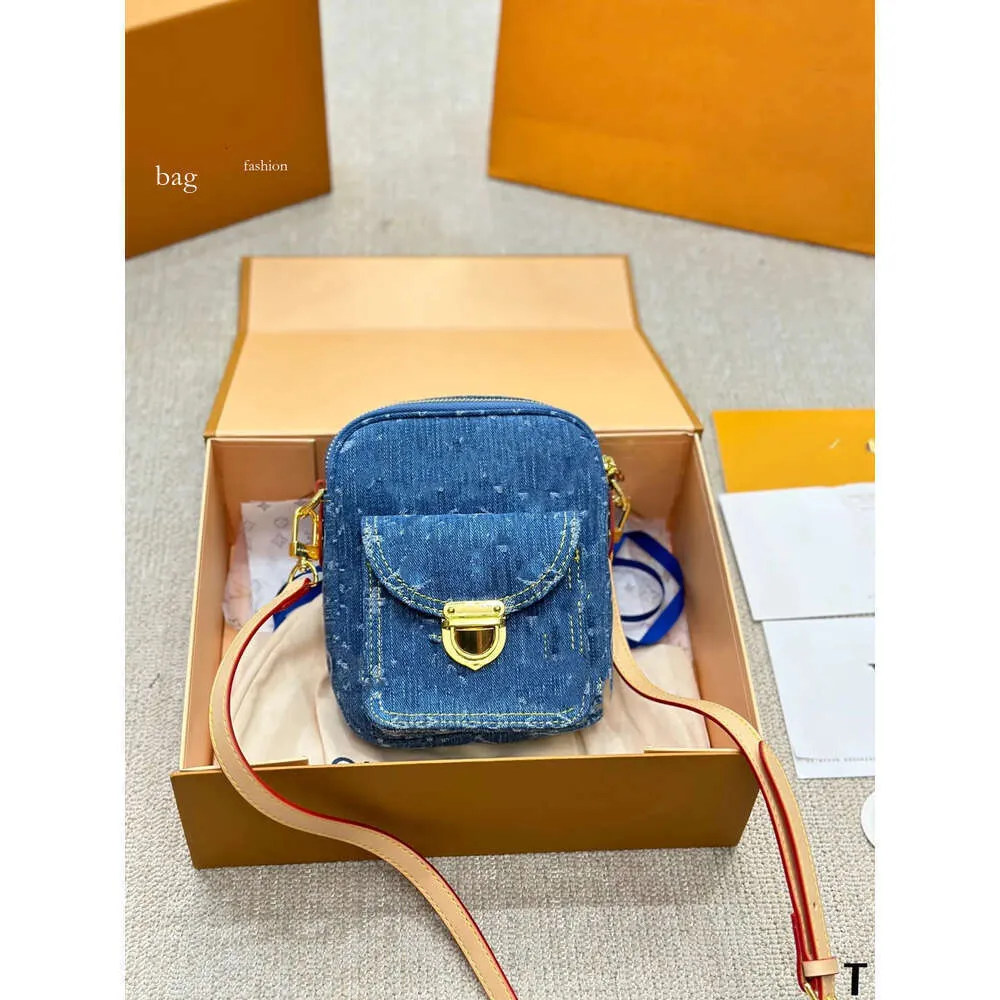 Créateur de mode Denim Vintage épaule femmes fourre-tout sacs à main en toile vieille fleur sous les bras sac à main imprimé sac à dos or matériel pochette 40995 44460 44464 luxe chaud