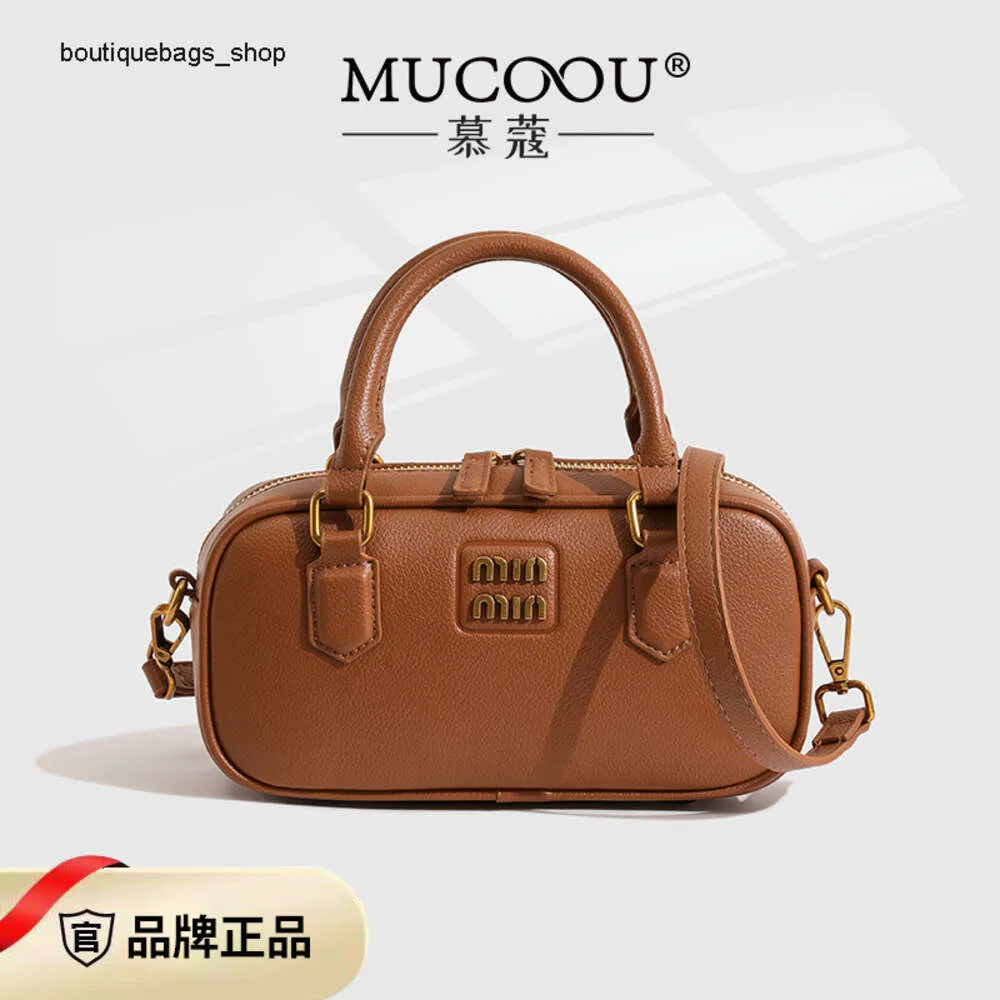 Bolsas de marca de moda por atacado transfronteiriças Mu Kou Light Luxury Boston Small Bag Womens New Trendy One Ombro Crossbody Maillard French Crowd