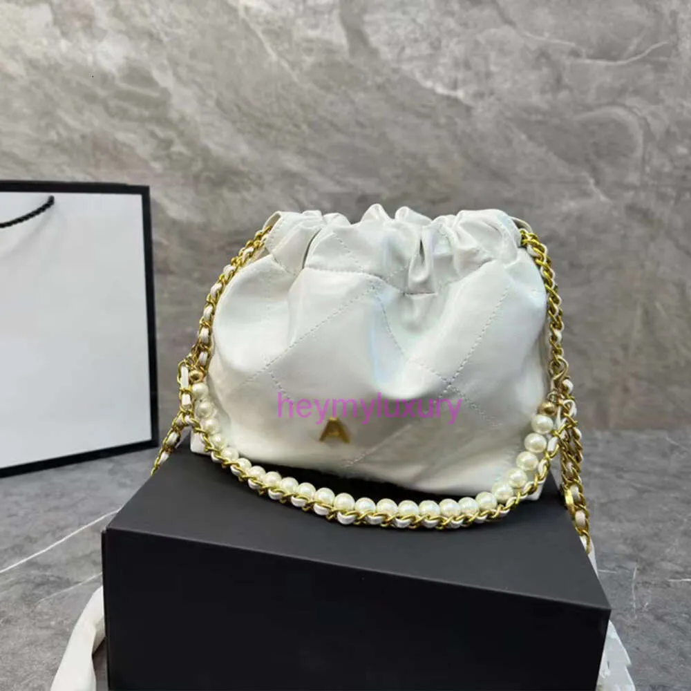 Designer Femmes Hobo Bucket Sac à provisions de seau Luxury Chanelsness C Pearls Chain Trawstring Tote Hands Sacs Lady Oil Wax Leather Mini Cossbody Sacs