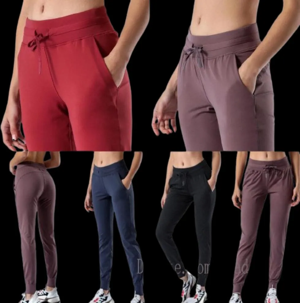 Women joga tkanina nagi trening sportowy sporty joggery kobiety w talii fitness fitness biegający spodnie z dwoma bocznymi pocke4556225