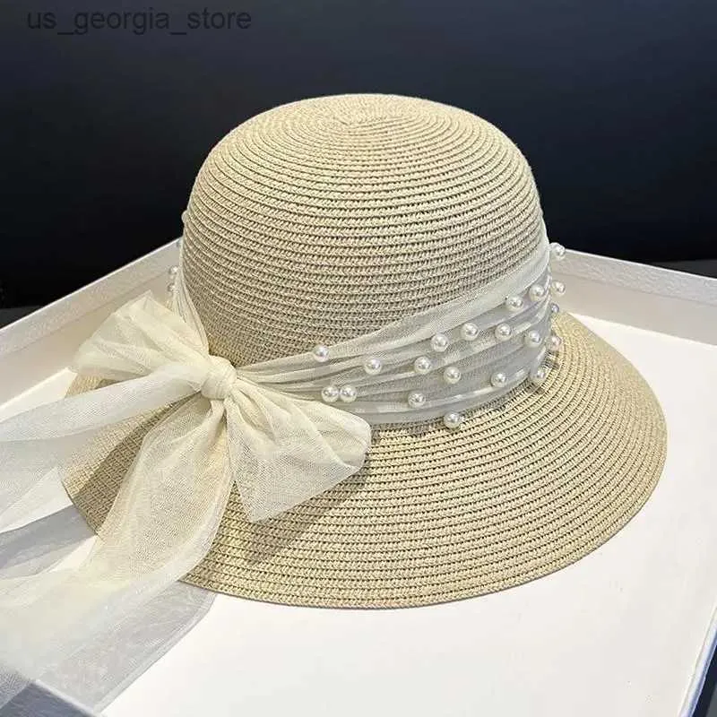 Large bord chapeaux seau chapeaux été élégant Str dentelle perle Net ombre Str chapeau femmes arc français Grand pêcheur chapeau Y240319