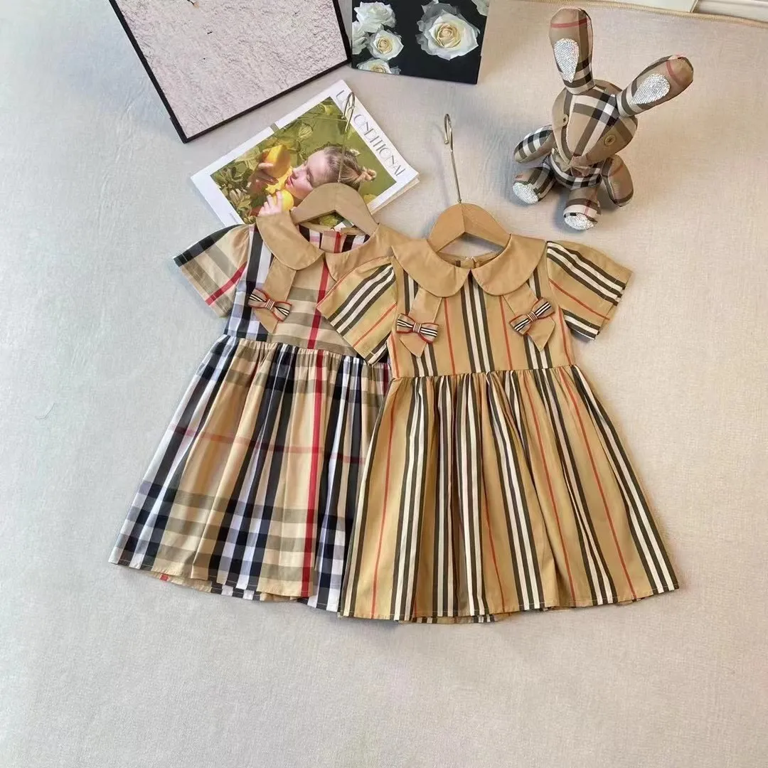 British Style Girls Plaid Dresses Summer Children Stripe Bow Lapel Short Sleeve Pleated Dress Preppy Style Kids Cotton Designer Clothes S1228