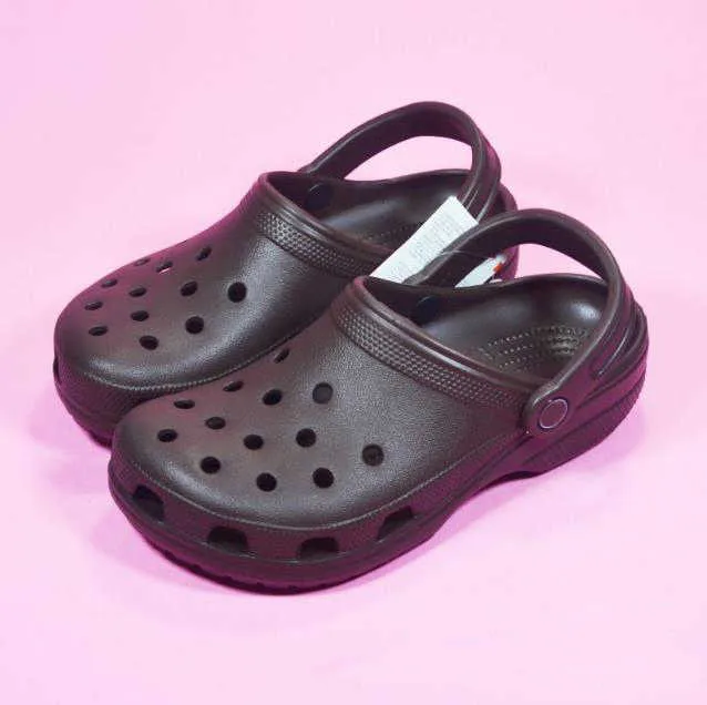 HBP Niet-gloednieuwe zomer mannen vrouwen luxe platte sandalen slippers gat schoenen strand slides designer EVA casual klompen voor jongens meisjes