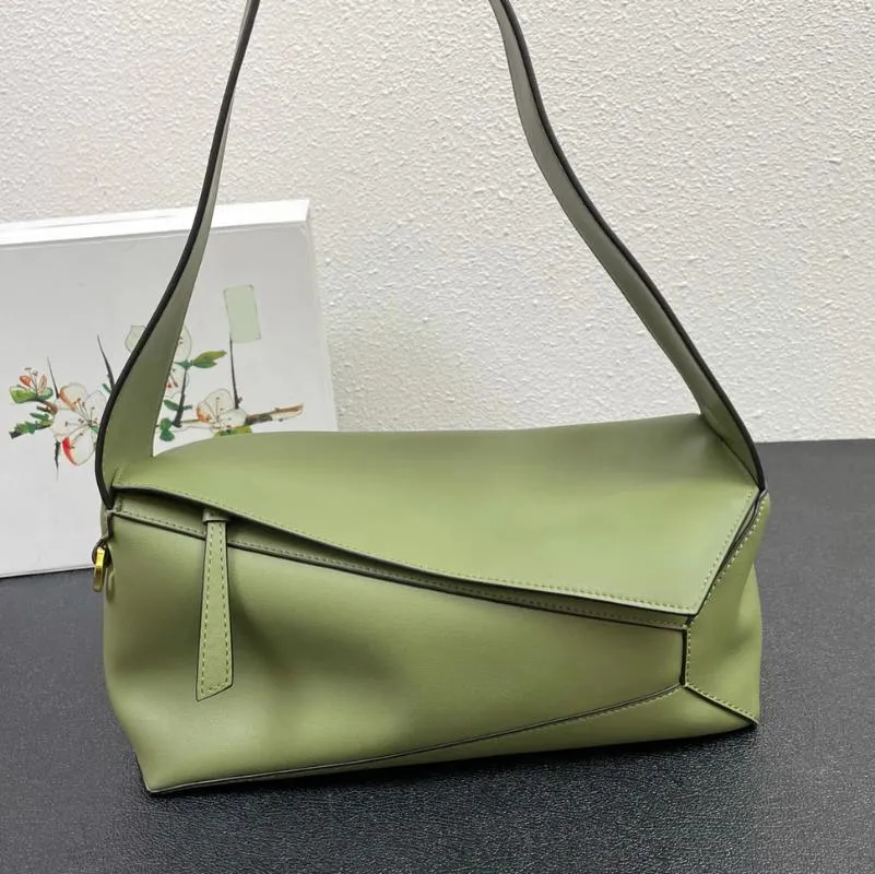 Borsoni Borsa sottomanica geometrica di moda 2024 Borsa monospalla in morbida pelle bovina di alta qualità Concisa per il tempo libero Pacchetto versatile da donna