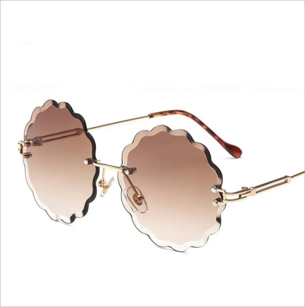 WholeScalloped Randlose Sonnenbrille, runde, stilvolle Designer-Sonnenbrille mit Farbverlauf für Damen, Retro-Sonnenbrille in Blumenform, 2018, cla6899296