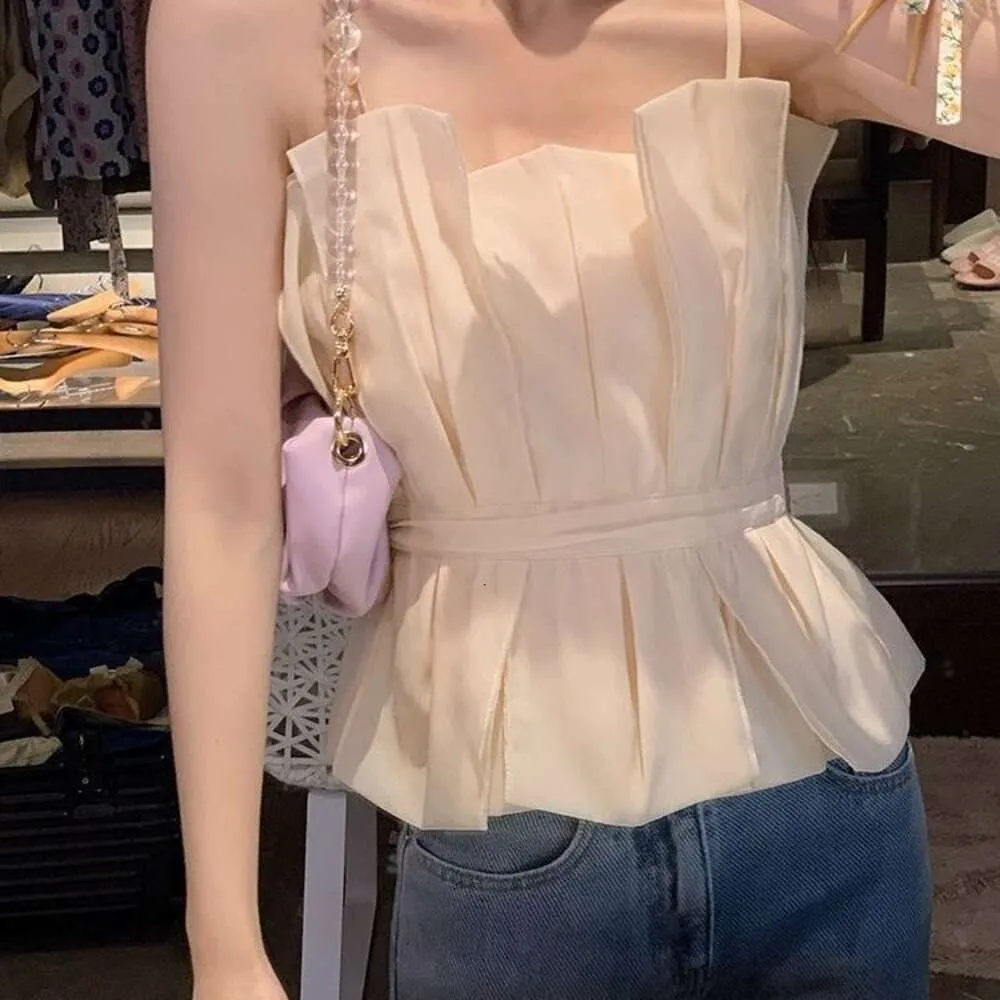 A niche design camisole vest for women in the summer of 2024featuring a new western-style patchwork three-dimensional pleats and a gentle waistband top