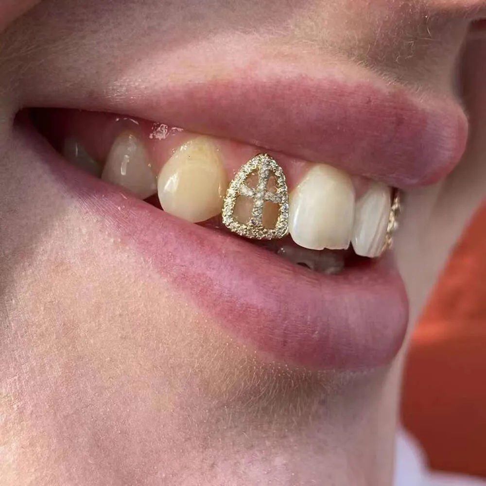 Rachelz Hip Hop pusty cyrkon zęby krzyżowe Grillz 14K złota platowane czapki stone