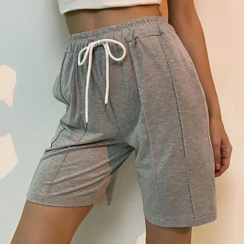 Löpande shorts solid färg stilfulla kvinnors elastiska midja dragskon med fickor för sommar fitness casual wear