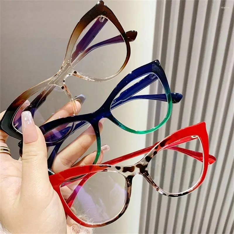 Lunettes de soleil style œil de chat anti-lumière bleue mettant en valeur la personnalité et la tendance, les miroirs plats irréguliers conviennent pour associer des vêtements