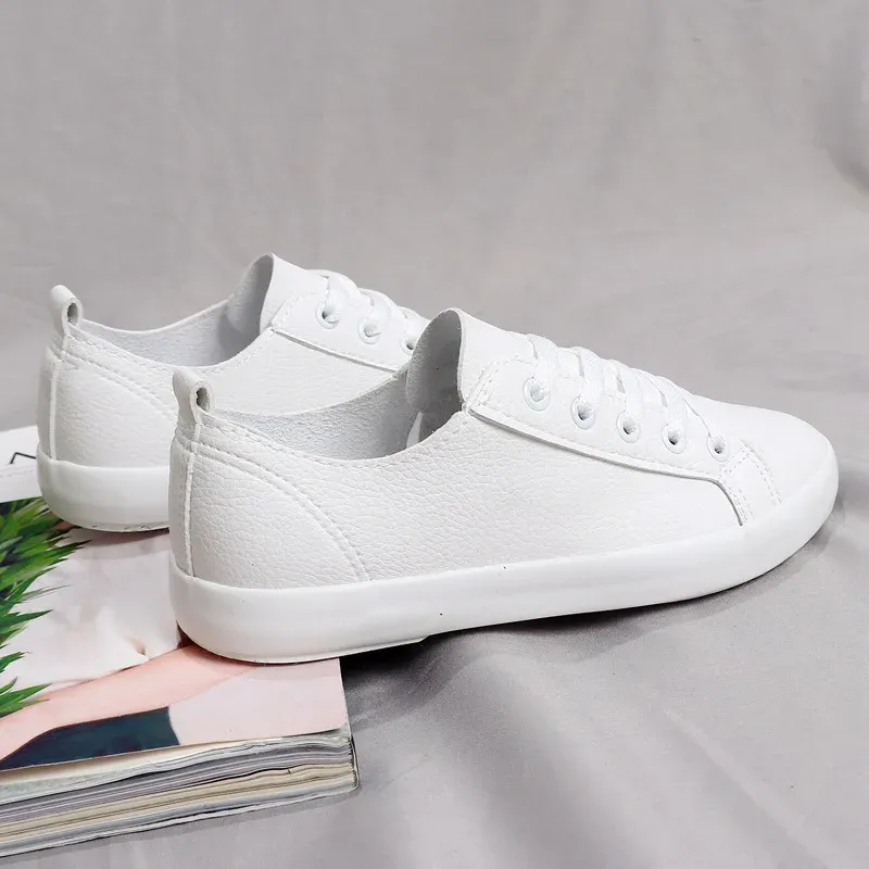 Flats lente nieuwe stijl platte canvas zachte pu witte schoenen vrouwelijke wilde literaire kant student comfortabele casual sportschoenen promotie