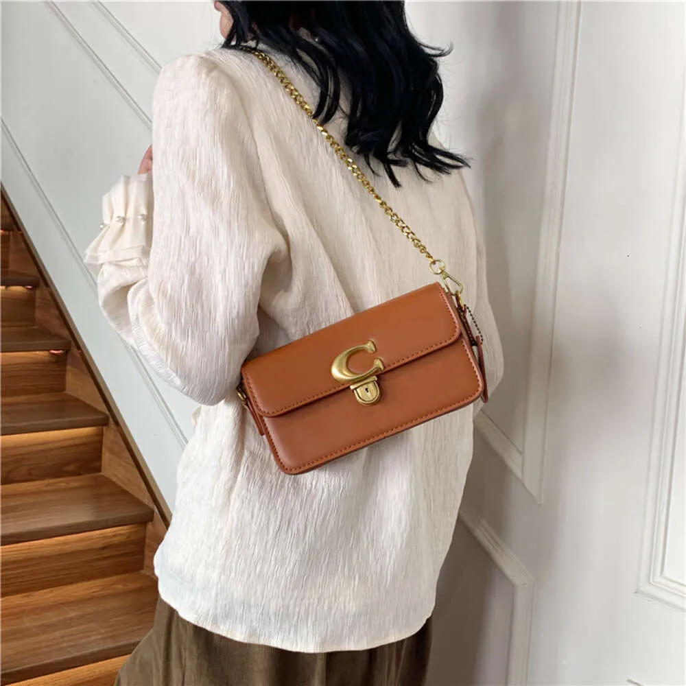 Bolsa feminina elegante de alta qualidade 2024, nova textura, bolsa crossbody, corrente elegante, bolsa de ombro único, 78% de desconto no atacado da loja