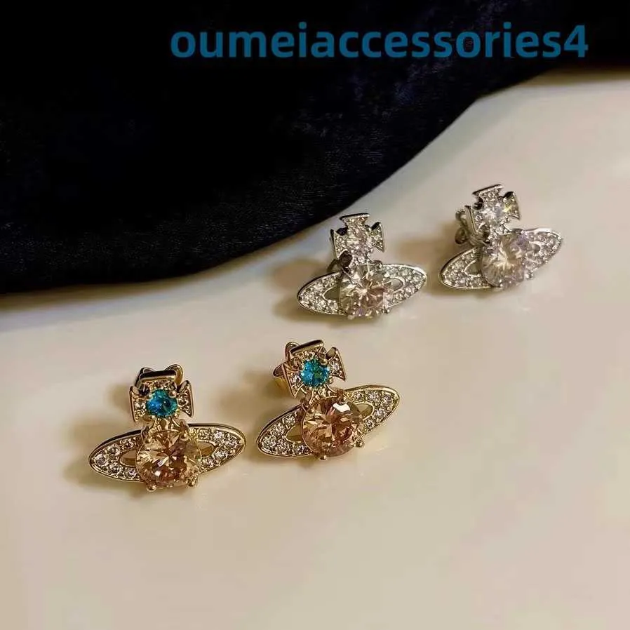 Pendientes de marca de lujo de diseñador para mujer, aretes de emperatriz occidental, estilo de cristal de Saturno, sencillos y versátiles