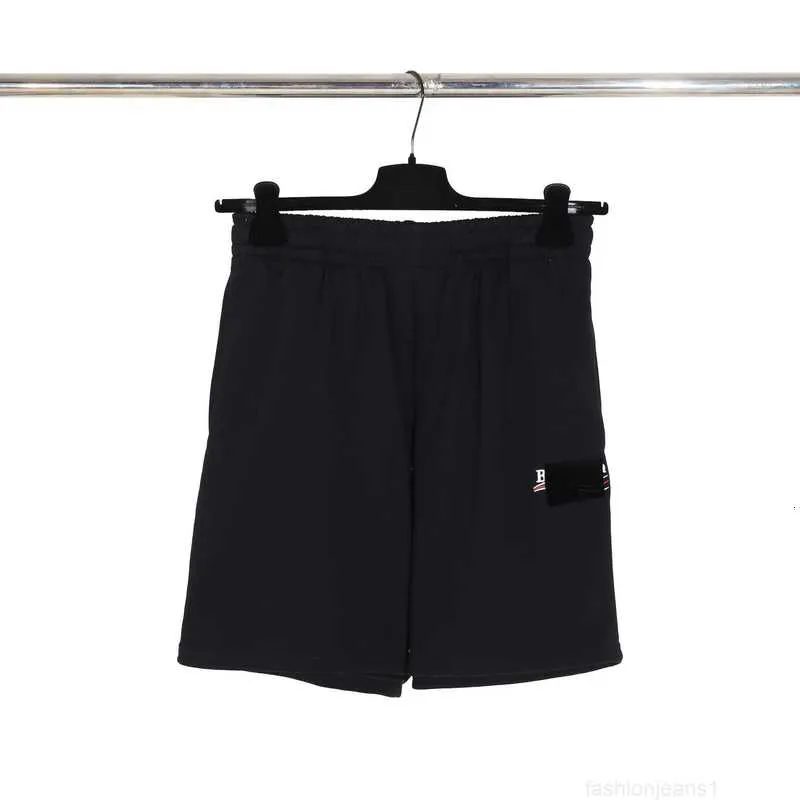 Diseñador La versión correcta de Paris B Classic Cola Black Tape, pantalones y pantalones cortos sanitarios holgados para hombres y mujeres con una longitud de cinco partes3TU6