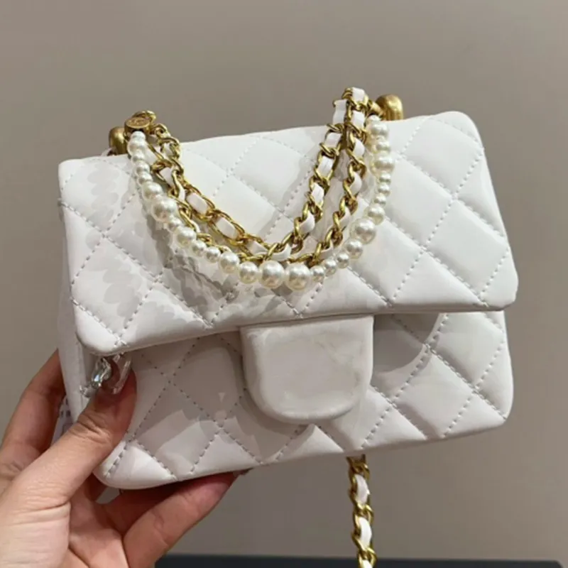 Klassisk Pearl Chain Mini Flap axelväskor Handväskor quiltat serienummer Crossbody Bag Luxury Designer Kvinnor äkta läder Multi Pochette Cosmetic Bag Totes