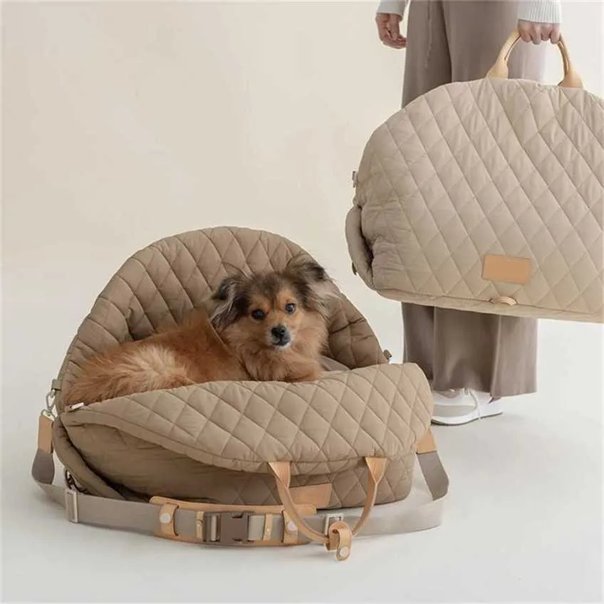 Sälj axelväskor Pet Dog Nest Nylon Tote Bag Läckbar handväska bil Dual Use Travel Cat Designer Handväskor 240311