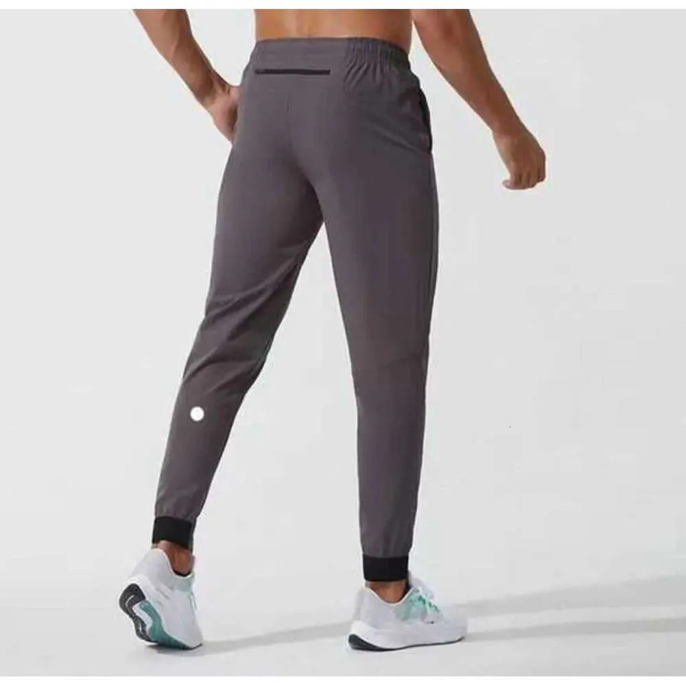 2024 Lululemeni Womens Short Men Pants Yoga Outfit Sport Drawstringジムポケットスウェットパンツズボンメンズエラスティック吸収性と通気性568ggg