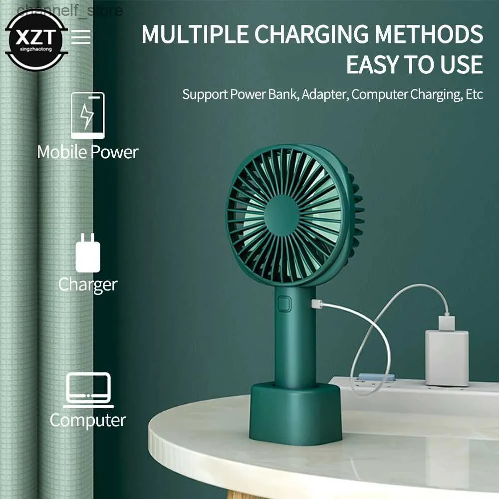 Electric Fans USB Mini Silent Small Fan med laddningsbas bärbar handhållen fläkt lång batterilivslängd lämplig för utomhus travely240320