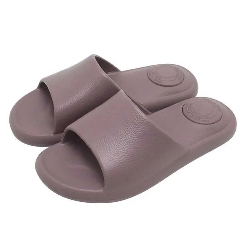 Tofflor Nytt mode sommarpar fast färglättnad Flat Slides Lithe tunna sandaler för kvinnor män hem inomhus flip flops01umc0 h240322