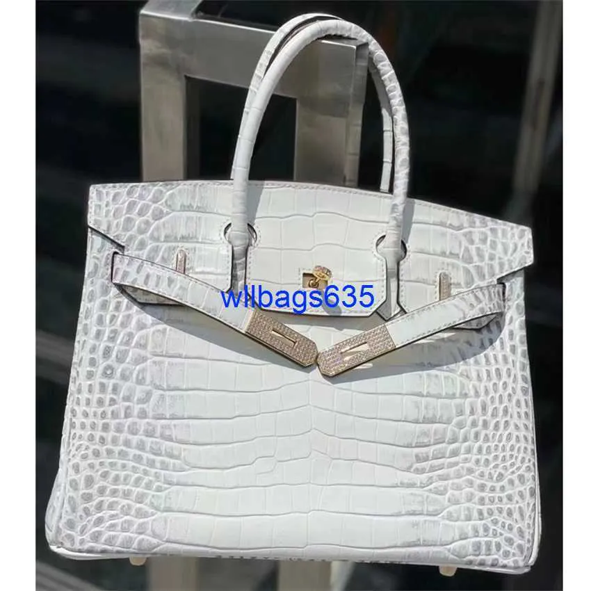 Tygväskor Himalaya Crocodile Handbag Äkta high end Crocodile -mönstrad handväska för kvinnor 2024 Ny bärbar väska Himalayan vit inlagd D har logotyp HBVH60