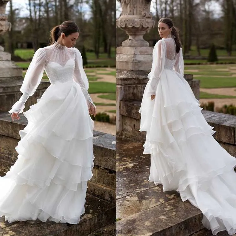 Elegante em camadas em cascata babados uma linha vestidos de casamento alta pescoço contas manga longa bellanaija nigeriano árabe país vestidos de noiva