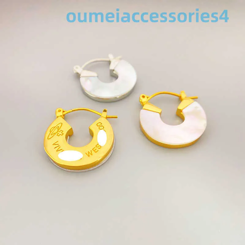 Designer de joias de marca de luxo Western Empress Dowagerearring Xis mesmo estilo de brincos incrustados com conchas para mulheres cobre amarelo galvanizado 18k ouro real