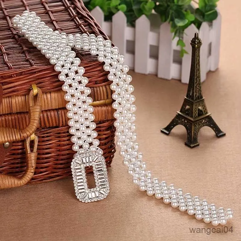 Bälten White Faux Pearl Midje kedja för kvinnor Elegant Elastisk midjeband ihålig ut spänneklänning Bältelbälten för kvinnor