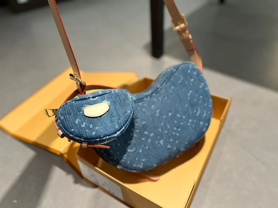 Bolso de guisante vintage de mezclilla Bolso de hombro de diseñador para mujer Bolso cruzado vintage Cartera de mano Estampado clásico Bolso de lona de mezclilla azul