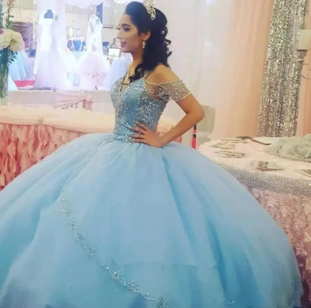 2019 Elegant Light Sky Blue Quinceanera Dresses Spaghetti with Beads Princess Ball Gowns Floor Length Girls Prom Party Gowns6773976