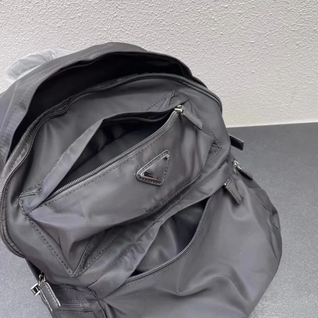 Sac à bandoulière de créateur pour hommes et femmes, sac à dos en tissu de nylon imperméable de grande capacité