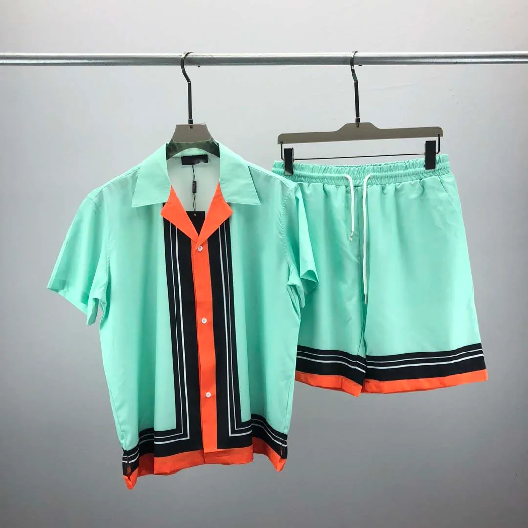 23SS Mens Designers Tracksuit Set Luxury Classic Fashion Hawaiian Shirts Tracksuits Pineapple Print Shorts Shirt Short Sleeve Suit #044