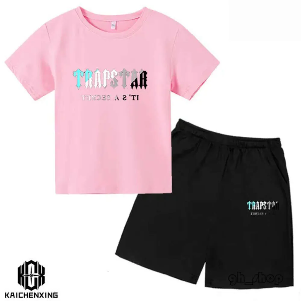 T-shirts 2024 Zomer TRAPSTAR T-shirt Kinderen Jongens Strand Shorts Sets Streetwear Trainingspak Mannen Vrouwen Kleding Meisjes Sportkleding Shirt 7057