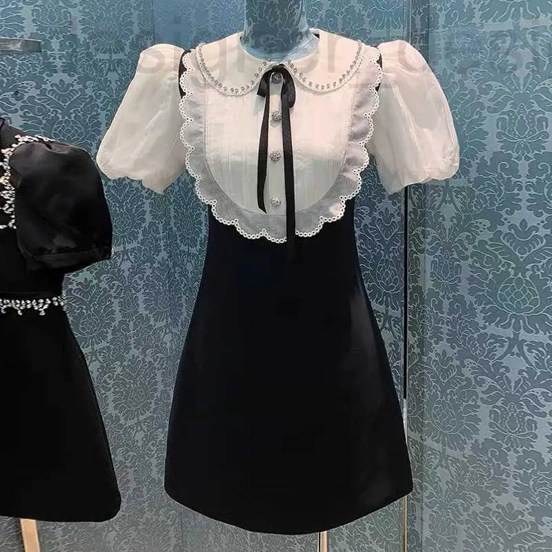 الفساتين العادية الأساسية مصممة العلامة التجارية Miu Miao فستان عالي الجودة الصيف فقاعات جديدة الأكمام دمية رقبة موعية القوس الماس الخصر xkz9