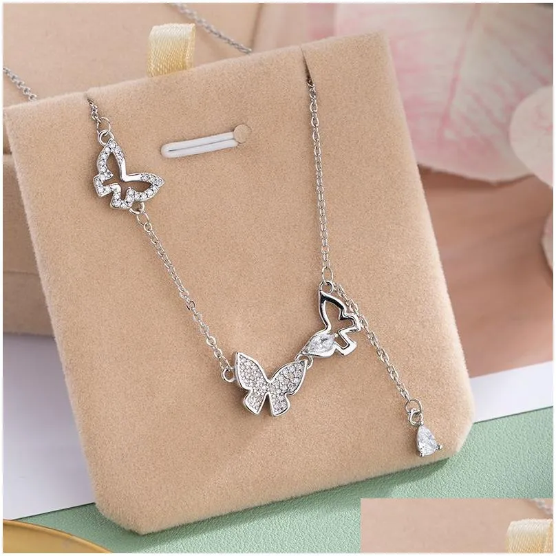 925 sterling silver hollowed out diamond butterfly tassel necklace for womens personalized collarbone chain wedding jewelry