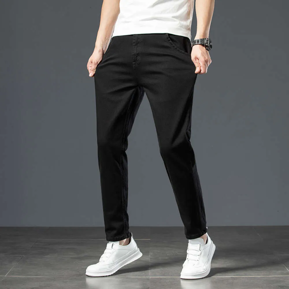 Yeni modaya uygun erkekler sıradan pantolon 2024 bahar orta bel çok yönlü ince uyum düz bacak kot pantolon erkekler için