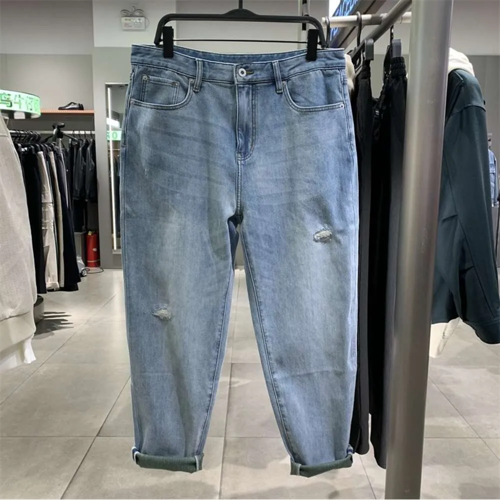 Elastiska avsmalnande jeans för mäns lösa små raka benbyxor med hål, amerikanska Harlan Dad Pants B1hae1141