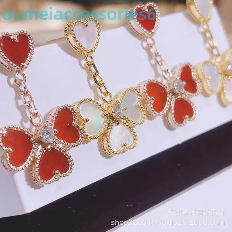 2024 Jewelry Designer Brand Vanl Cleefl Arpelsstud Earrings Four Leaf Grass for Womens Shaped Love 18k Rose Gold Heart Tassel Earrings