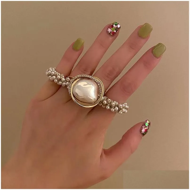 Andra modetillbehör Tunga industrin Pearl Hair Ring Headrope Headwear Small Tie Horse Tail Rope Light Luxury Drop Delivery Otmzg