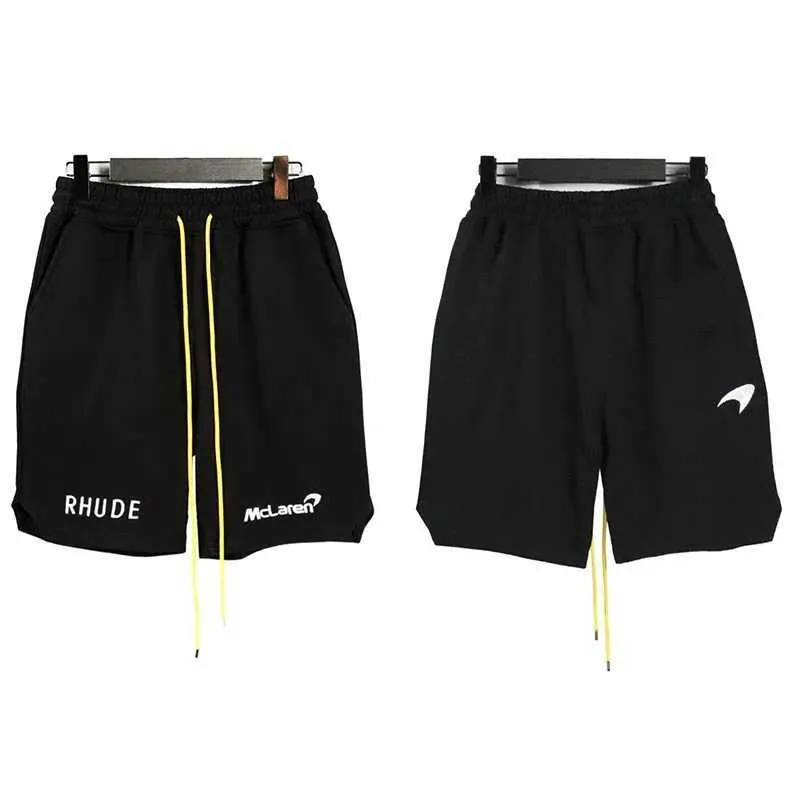 Mäns shorts x McLaren Shorts Summer High Street Mens 1 1 broderad extra stor sport fem poäng byxor trendiga J240322