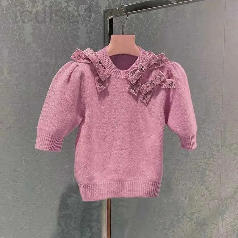 Kvinnors t-shirt designer märke 23 våren ny miu kort stickad skjorta fransk söt rosa hylsa tung industri bubbla topp 7hmd