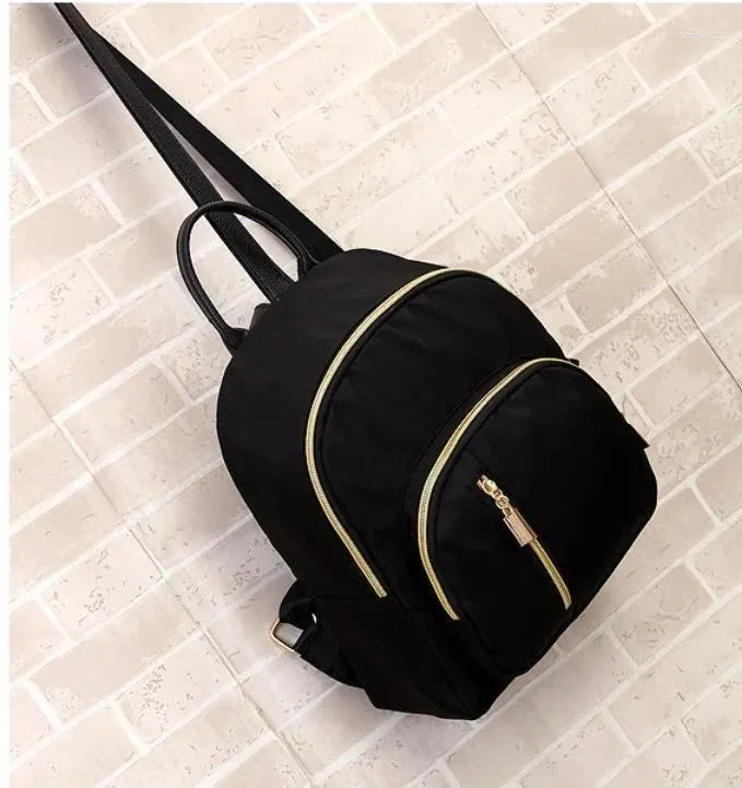 black pu leather school backpack with gold zipper Mason (Black and Gold) With two clever compartments — one for you and one for baby Emma & Chloe Mini Travel