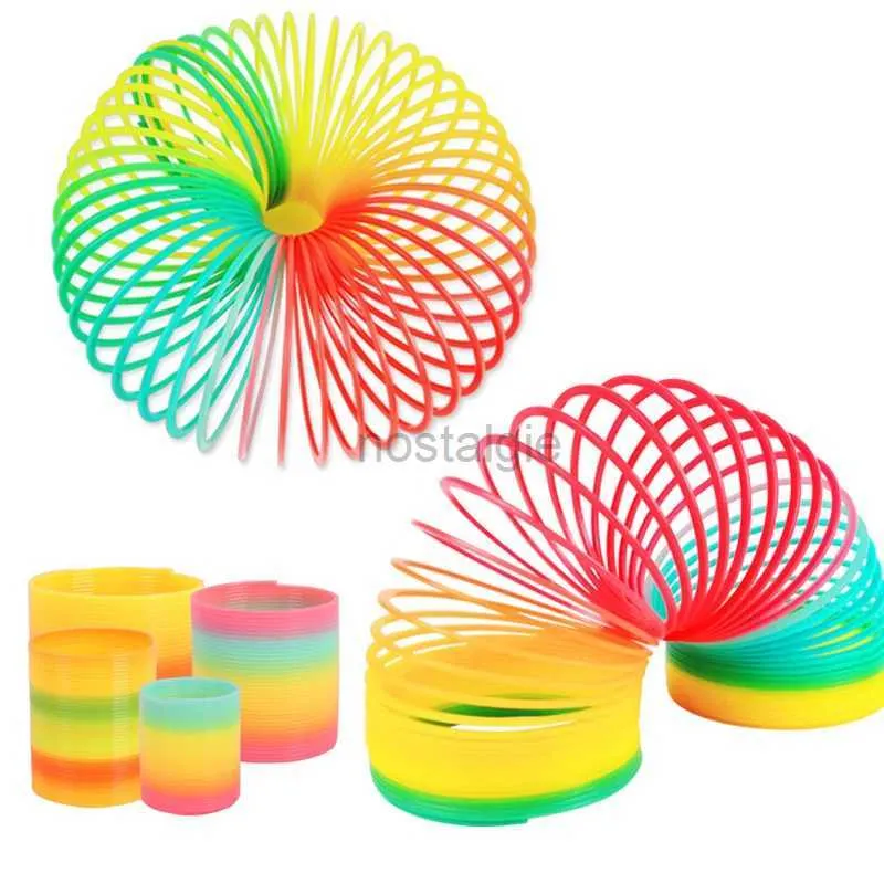 Sortera häckning stapling leksaker Rainbow Circle Fun Toy Early Development Education Folding Plastic Spring Coil Childrens Creative Magic 24323