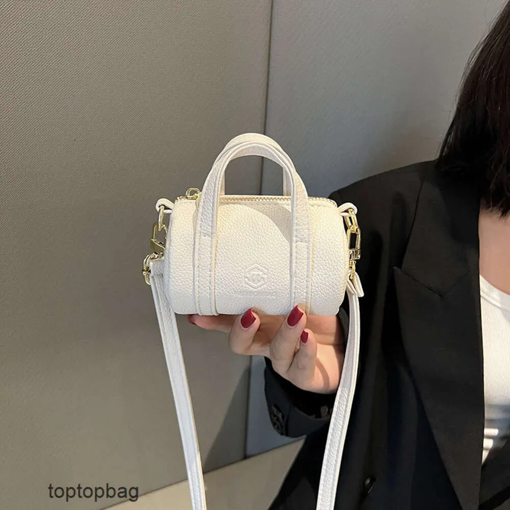 Designer Luxury fashion tote bags Wallets Korean Lychee Pattern Cylinder Bag 2023 New Fashion Trend Versatile Handbag Single Shoulder Crossbody Bag for Women